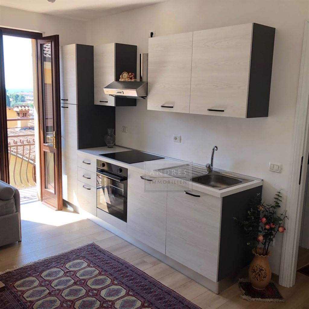 Maderno-Bilocale-F09-Soggiorno-Cucina